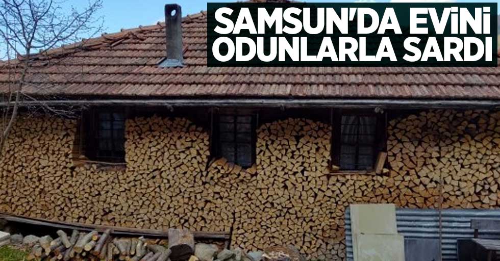 Samsun'da evini odunlarla sardı
