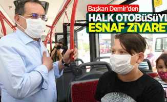 Başkan Demir'den halk otobüsüyle esnaf ziyareti
