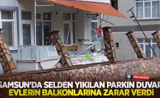 Samsun'da selden yıkılan parkın duvarı evlerin balkonlarına zarar verdi