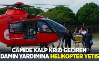Camide kalp krizi geçiren adamın yardımına helikopter yetişti