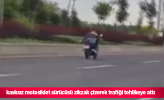 kasksız motosiklet sürücüsü zikzak çizerek trafiği tehlikeye attı