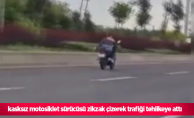 kasksız motosiklet sürücüsü zikzak çizerek trafiği tehlikeye attı